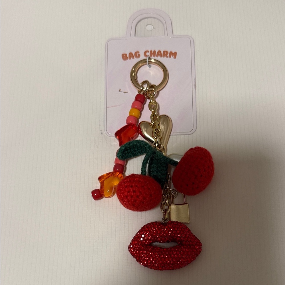 Anthropologie Green and Gold Bag Charm